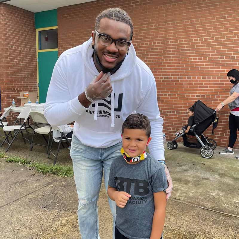 Paris with a child at a charity event